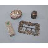 A late Victorian silver buckle, a William Comyns silver pill box, an 800 lipstick holder and a