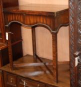 A 1920's mahogany folding tea table W.59cm