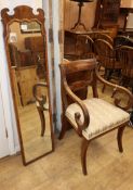 A George I style walnut fret cut robing mirror and a Regency mahogany elbow chair H.133.5cm