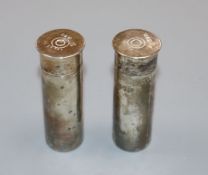 A pair of late Victorian novelty silver condiments, each modelled as a shotgun cartridge, Horace