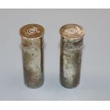 A pair of late Victorian novelty silver condiments, each modelled as a shotgun cartridge, Horace