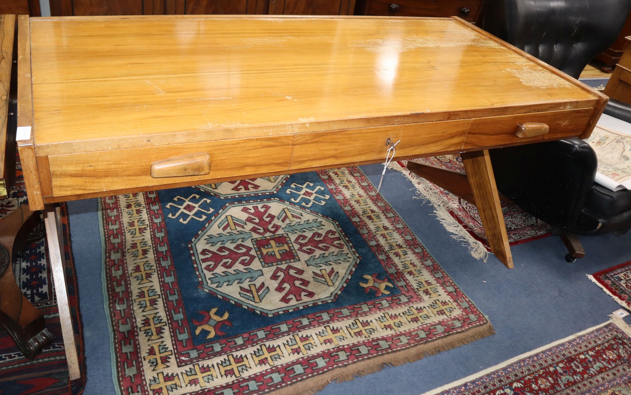 A teak Danish-style writing table W.170cm
