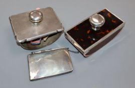 Two silver mounted blotters including one set with tortoiseshell and a silver mounted purse.
