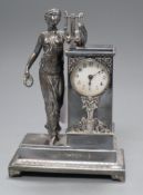 A WMF silver plated desk timepiece modelled as a maiden with a lyre height 19.5cm