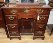 A George III mahogany kneehole desk W.80cm