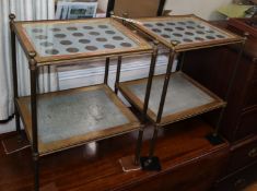 A pair of brass two tier coin inset top occasional tables W.42cm