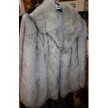 A half length silver fox coat