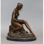 After Allegrain. A bronze statue of a seated nude. height 31cm