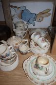 A Doulton Bunnykins part tea set and three related posters