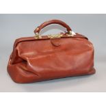 A brown leather Gladstone bag width 39cm