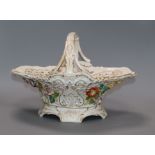 A Dresden floral encrusted porcelain basket height 22cm