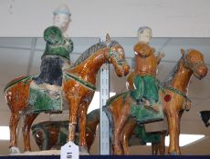 Two Chinese Tang-style pottery figures on horseback height 39cm