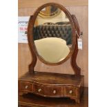 A George III inlaid mahogany serpentine fronted toilet mirror W.41cm