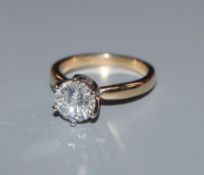 A 14k yellow metal and solitaire diamond ring, stone diameter approximately 7.50mm, size N.