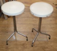 A pair of mid century chrome stools H.58cm