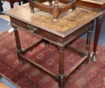 A 17th century style oak side table W.83cm