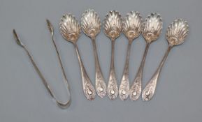 A set of six late Victorian silver shell bowl coffee spoons and tongs by Walker & Hall, Sheffield,