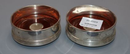 A pair of modern silver mounted bottle coasters, Birmingham, 1968, 91mm.