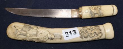 A Japanese Meiji carved staghorn dagger