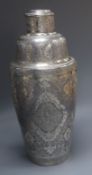 A Persian engraved white metal cocktail shaker, height 23cm, 561 grams.