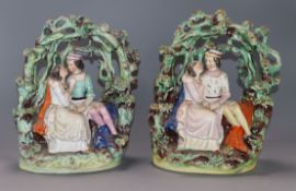 A pair of Victorian Staffordshire figure groups height 23.5cm
