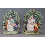 A pair of Victorian Staffordshire figure groups height 23.5cm