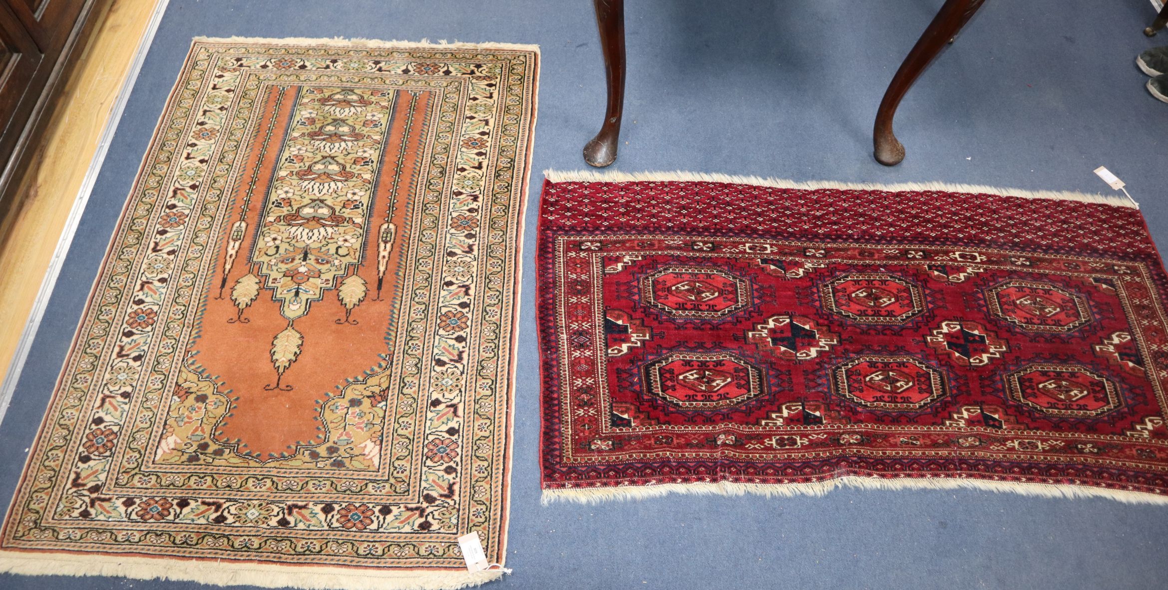 A Bokhara rug and a prayer rug Larger 132 x 94cm