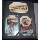 A 20th century postcard album, including comic, Ypres war damage, greetings, topographical and other