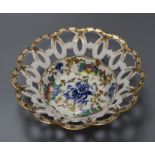 A Worcester blue and white printed and polychrome painted cake basket (a.f.)