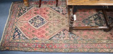 A North West Persian red ground runner 377 x 104cm