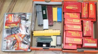 A comprehensive collection of Hornby Tri-Ang carriages, wagons, 12 engines/locomotives including