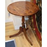 A 19th century provincial elm circular occasional table on tripod base Diameter 52cm