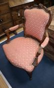 A Louis XV style walnut open armchair