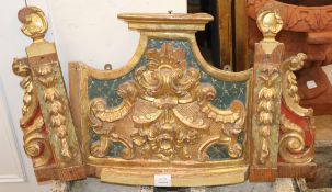 A 19th century polychrome and gilt pediment W.75cm