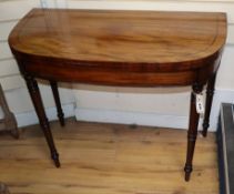 A Regency mahogany D-shaped folding top card table W.92cm