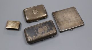 A Russian 84 zolotnik silver and niello cigarette case, Moscow, Assay Master BC 1872 and three other