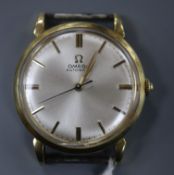 A gentleman's 1940's 750 yellow metal Omega automatic wrist watch, movement c. 28.10 RA, no strap.