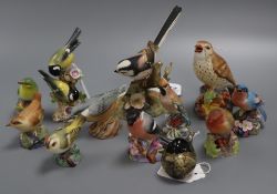 A Goebel model, 'Great Titmouse' and ten Royal Worcester models of birds, comprising Blue Finch,