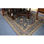 A Tabriz blue ground rug 208 x 145cm