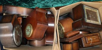 A large quantity of mantel clocks