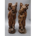 A pair of Chinese carved hardwood figures of sages height 53cm