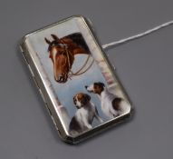 A Continental 935 white metal and enamelled cigarette case decorated with a horse and two hounds