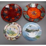 Two Poole Pottery wall chargers, 'Exodus' and 'Volcano' and two limited edition plates, Coalport '