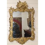 A carved giltwood and gesso wall mirror H.98cm