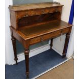 A Victorian burr walnut five drawer writing table with leather inset top W.90cm