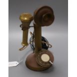 A brass stick telephone