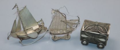 A Dutch white metal miniature model sailing boat, a white metal filligree miniature sailing boat and