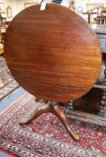 A George III mahogany circular occasional table with bird-cage support on tripod base Diameter 86cm