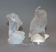 A Lalique frosted glass owl mascot and another of a kneeling nude woman, each with etched