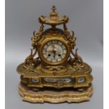 A gilt metal and porcelain mantel clock height 37cm